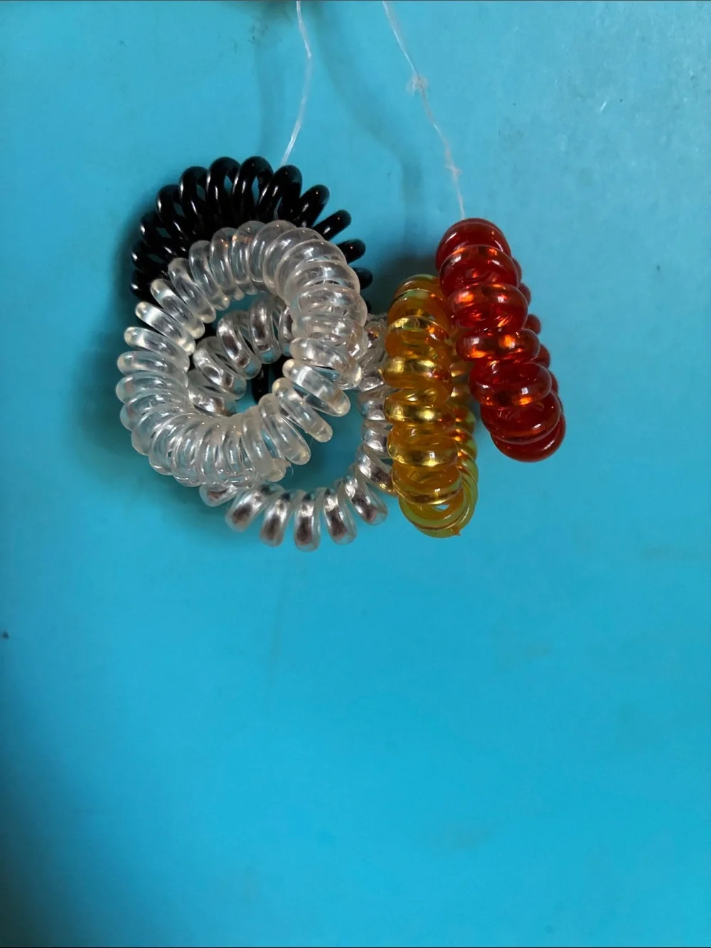 Set of 5 Spiral Coil Hair Ties in Red, Gold, Silver, Black & Clear